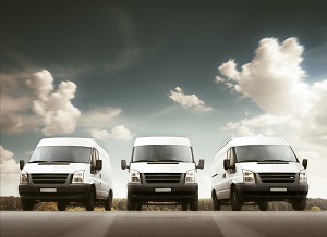3 white delivery vans